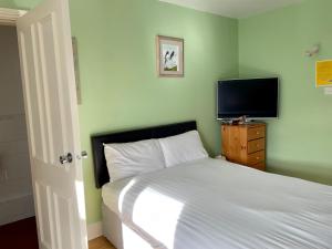 Letto o letti in una camera di An Stór Townhouse