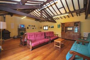 TV a/nebo společenská místnost v ubytování Albergue La Posada Cangas de Onis