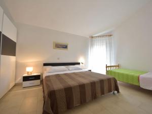 Postel nebo postele na pokoji v ubytování Seaside apartments
