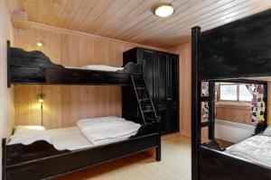 Двухъярусная кровать или двухъярусные кровати в номере Tinden