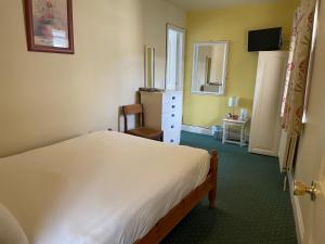 Letto o letti in una camera di An Stór Townhouse