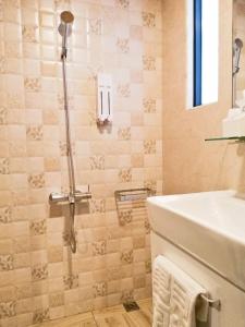 A bathroom at See U Tainan Apartment