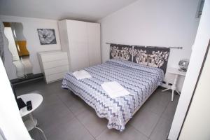 Кровать или кровати в номере Residence Le Betulle Executive