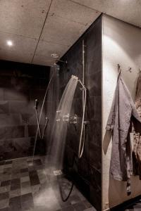 Koupelna v ubytování Base Aktivhotel Montafon + 37 fotografií