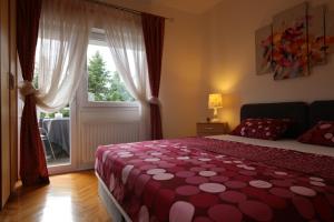 Cama o camas de una habitación en Apartment Cvjetna