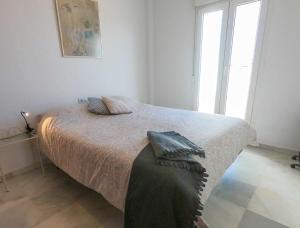 Posteľ alebo postele v izbe v ubytovaní Terraza Trafalgar Apartamento tipo penthouse con enorme terraza y vistas al mar