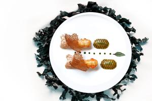 a plate of food with starfish on it at MAISON KERVARREC - Rennes - Saint-Grégoire in Saint-Grégoire +42 photos
