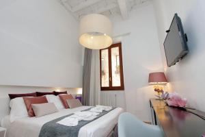 Voodi või voodid majutusasutuse B&G Navona Apartment toas