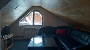 Posezení v ubytování Pansion Rog Jahorina