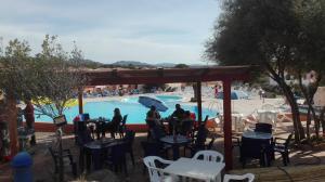 Bazén v ubytovaní casa mirice in residence con piscina ,wifi,climatizzatore vicino al mare alebo v jeho blízkosti