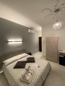 Postel nebo postele na pokoji v ubytování B&b regina del porto
