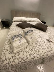 Postel nebo postele na pokoji v ubytování B&b regina del porto