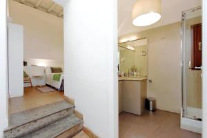 Voodi või voodid majutusasutuse B&G Navona Apartment toas