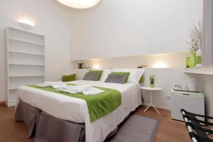 Voodi või voodid majutusasutuse B&G Navona Apartment toas