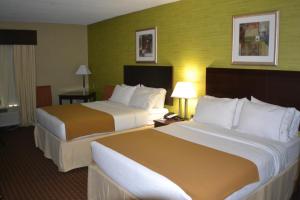 a hotel room with two beds in a room at Holiday Inn Express Hotel & Suites Indianapolis W - Airport Area, an IHG Hotel in Indianapolis