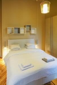 Postel nebo postele na pokoji v ubytování ComfortZone Zagreb center apartment