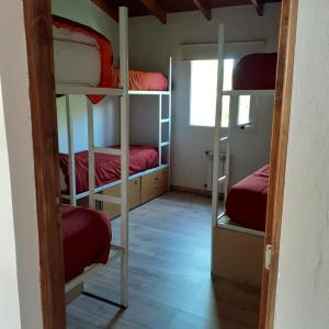 Krevet ili kreveti na kat u jedinici u objektu Mistico Hostel 23