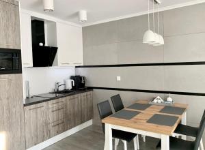 Kuchyňa alebo kuchynka v ubytovaní Apartament RELAX