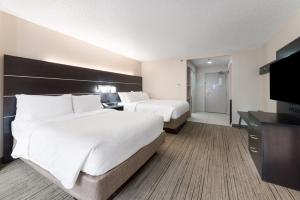Cama ou camas em um quarto em Holiday Inn Express - Columbus Downtown by IHG