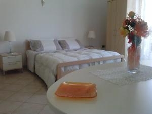 Postel nebo postele na pokoji v ubytování B&B Ore Liete