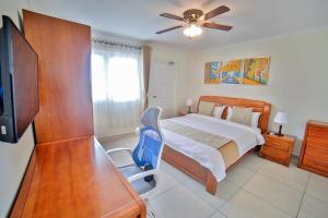 Voodi või voodid majutusasutuse Pearl Aruba Condos toas