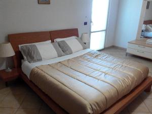 Postel nebo postele na pokoji v ubytování B&B Ore Liete