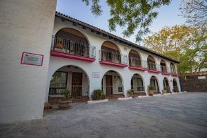 a building with balconies on the side of it at Casa Maru Hotel in Parras de la Fuente