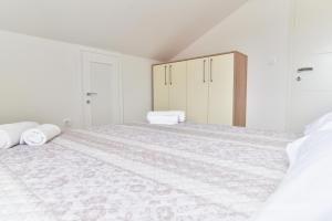 Postel nebo postele na pokoji v ubytování Sandy beach apartments