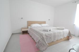 Postel nebo postele na pokoji v ubytování Sandy beach apartments