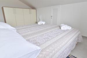 Postel nebo postele na pokoji v ubytování Sandy beach apartments