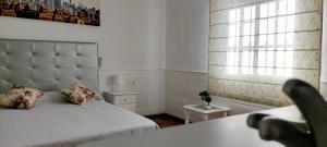 A bed or beds in a room at Villa yasleni