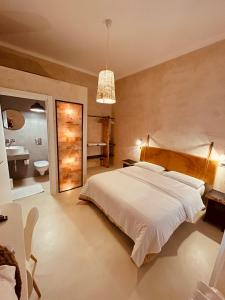 A bed or beds in a room at Casa Citta