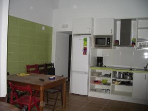 A kitchen or kitchenette at Albergue El Castillo