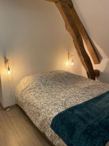 Ένα ή περισσότερα κρεβάτια σε δωμάτιο στο L épicéa