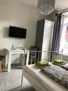 TV a/nebo společenská místnost v ubytování Apartment by Mario