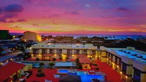 an aerial view of a city at sunset at Pearl Aruba Condos in Palm-Eagle Beach