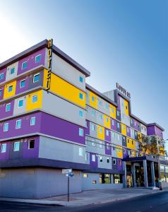 a colorful building on the side of a street at Hotel Modular Express Calama in Calama
