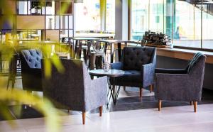 Khu vực ghế ngồi tại Hotel Modular Express Calama