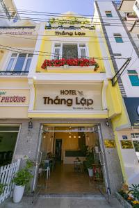 a hotel thineléléléiane entrance to a building at Thang Lap Hotel in Da Lat