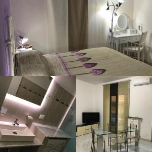 Zimmer mit einem Bett und einem Waschbecken sowie einem Bad in der Unterkunft Polly in Rapallo