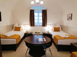 Ένα ή περισσότερα κρεβάτια σε δωμάτιο στο River Apartmanház