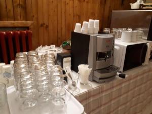 Příslušenství pro přípravu čaje a kávy v ubytování Hotel La Piccola Baita