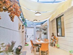 A patio or other outdoor area at See U Tainan Apartment
