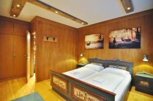 Katil atau katil-katil dalam bilik di Pension & Apartments Weissbriach