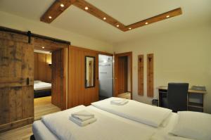 Katil atau katil-katil dalam bilik di Pension & Apartments Weissbriach