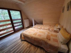 Postel nebo postele na pokoji v ubytování Zelený dom