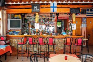 Lounge o bar area sa elenis village