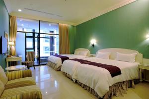 Ένα ή περισσότερα κρεβάτια σε δωμάτιο στο Muen Hot Spring Hotel