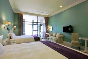 Ένα ή περισσότερα κρεβάτια σε δωμάτιο στο Muen Hot Spring Hotel