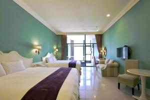 Ένα ή περισσότερα κρεβάτια σε δωμάτιο στο Muen Hot Spring Hotel